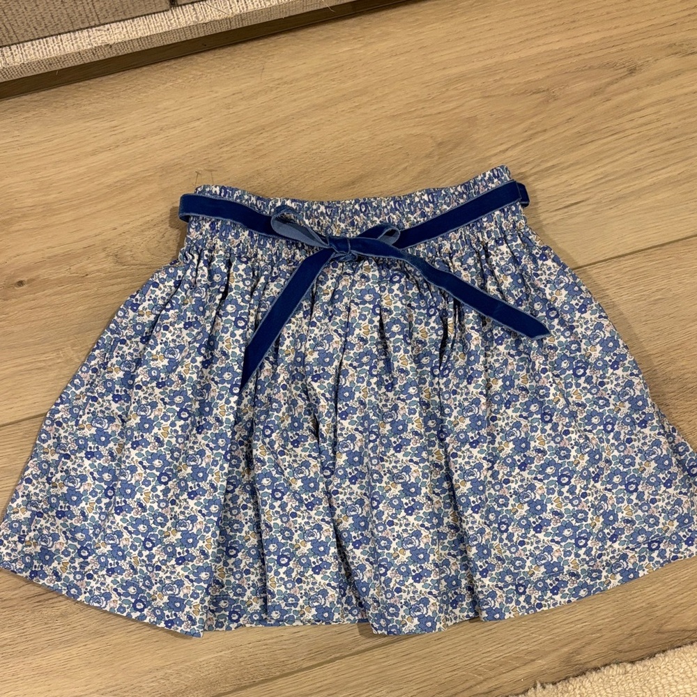 Trotters London girl’s Floral Blue Skirt with Velvet Bow